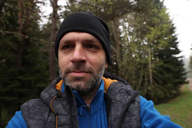 istock The traveler man walking in forest 1493610403