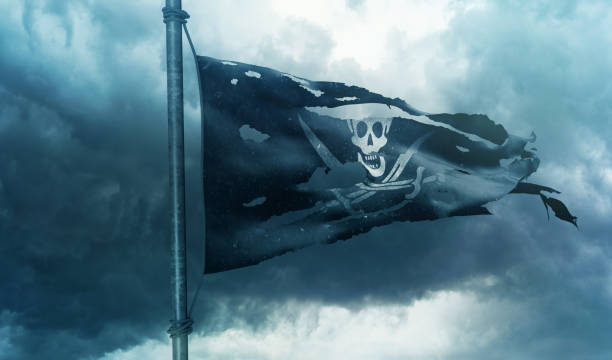 istock Pirate Flag, Worn and waving pirate flag 1493612112