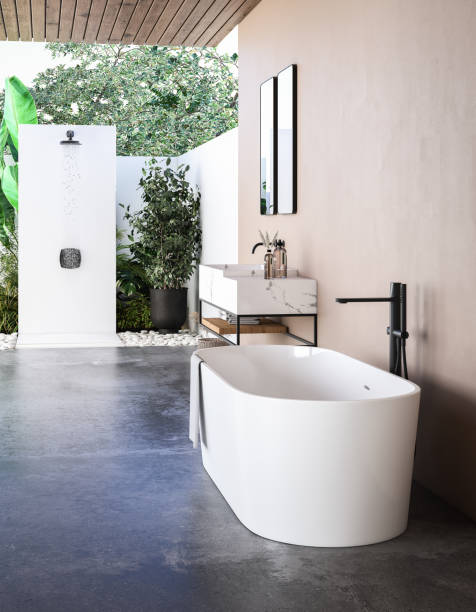 istock Modern bathroom interior with beige walls, marble basin with double mirror, bathtub and grey concrete floor. Minimalist beige bathroom with modern furniture. 3D rendering 1493616972