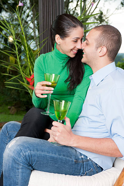 Young couple drinking white wine stock photo