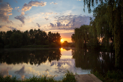 gorgeous sunset on a small fishing lake.
