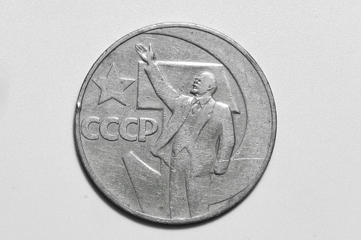 Old USSR money close-up on a white background. Macro photography of retro coins of the Soviet Union, vintage details