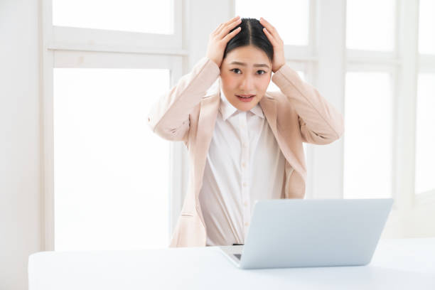 istock young asian businesswoman using laptop,think 1493633029