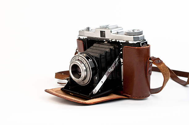 istock old camera lens bellows leather  case analog white background 149364219