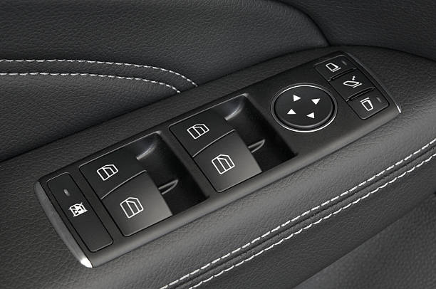 istock close up of a car door control panel buttons 149364274