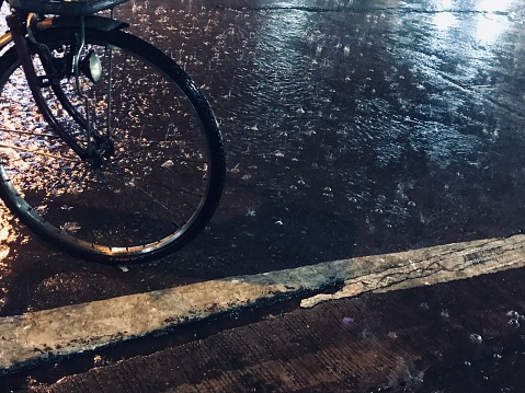 Bicycle wheel in the rain