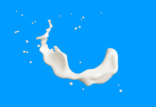 milk splash against blue background