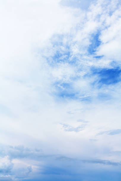 istock White cirrus clouds blue sky background, fluffy cumulus cloud texture closeup, beautiful cloudy skies, cloudscape, summer sunny day heaven, cloudiness weather backdrop, ozone layer, overcast, oxygen 1493659464