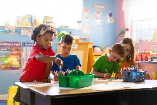 istock Childern learning and growing with their teacher in a daycare environment 1493661388