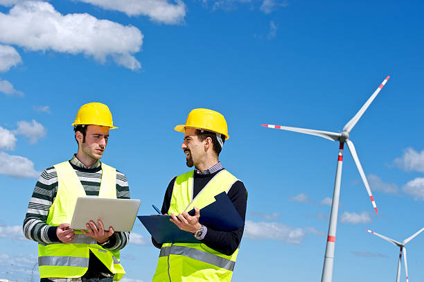 istock Two Engineers in a Wind Turbine Power Station 149366898