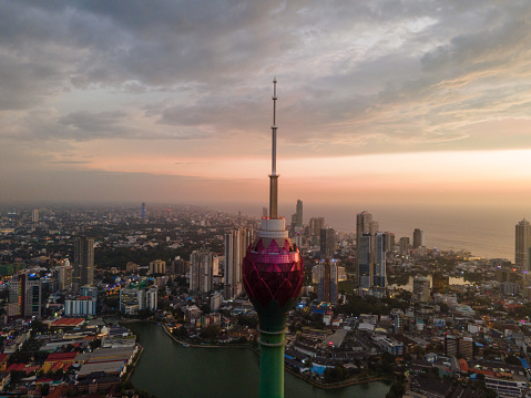 The Lotus Tower is an iconic telecommunications and observation tower in Colombo, Sri Lanka. Standing at approximately 356 meters (1,168 feet), it is one of the tallest towers in South Asia. Its design is inspired by the lotus flower, symbolizing purity and unity. The tower serves as a hub for broadcasting and telecommunication services and offers a panoramic view of Colombo from its circular observation deck. It represents a symbol of modernity and progress for Sri Lanka and is a popular tourist attraction.