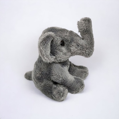 Gray elephant toy on a white background