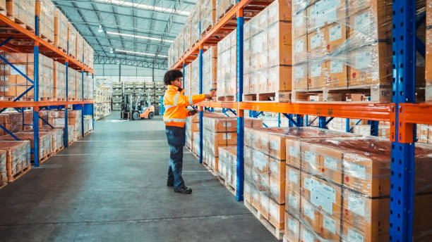 A warehouse worker woking in warehouse stock photo