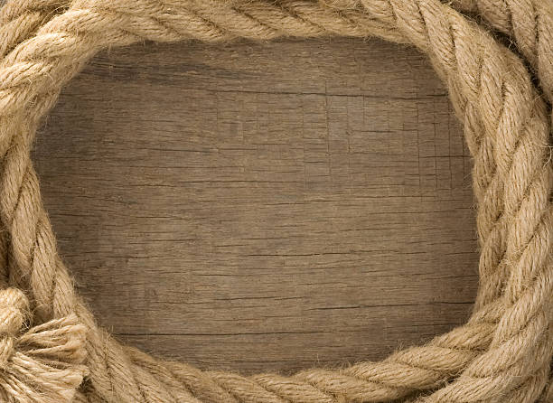 istock ship ropes and knot on wood background 149368037