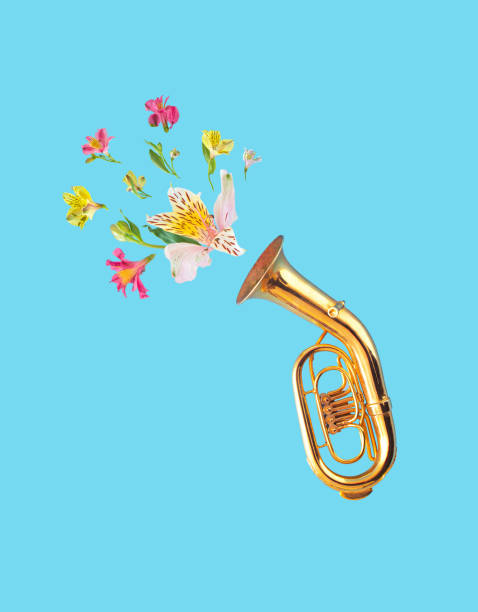 カラフルな空飛ぶユリの花を持つチューバ楽器のクリエイティブコンセプト。 - trumpet musical instrument jazz brass instrument ストックフォトと画像