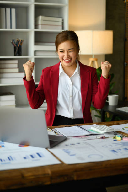 istock Surprised start up businessman looking at laptop screen, making winner yes gesture, celebrating business success. 1493690635
