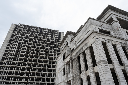 A close-up of an unfinished commercial building