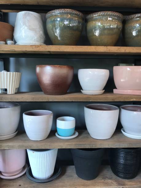 istock Ceramic vase in wooden shelf 1493690905