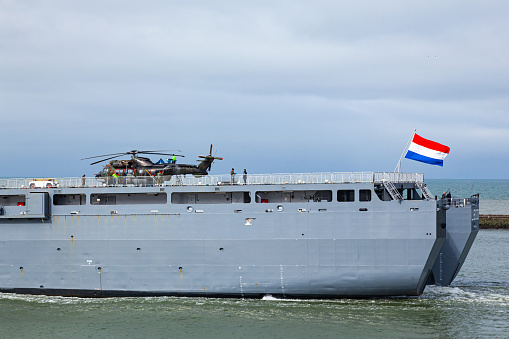 Rotterdam, Netherlands - 03.20.2021 - The Dutch warship HNLMS Rotterdam with a helicopter on board is moving in the bay of Rotterdam.