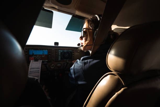 istock A young female pilot is skillfully maneuvering the aircraft 1493694780