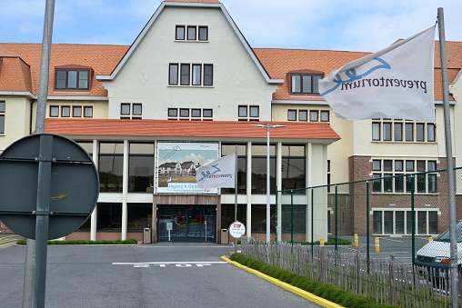 De Haan, West-Flanders, Belgium  - May 21, 5, 2023: entrance sea preventorium De Haan aan Zee facade clinic entrance and reception