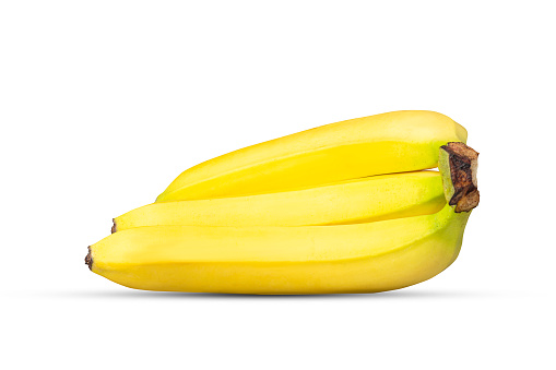 Three ripe bananas isolated on white background. Vegetables, fruits. Food.