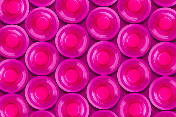istock Lots pink plastic bottles. Top view. Products, packaging storage recycling 1493697903