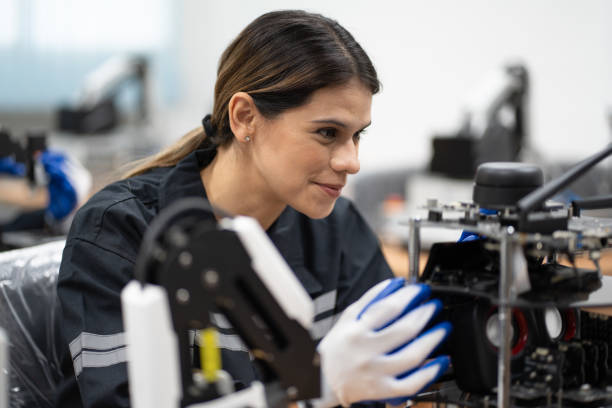 istock Engineer caucasian woman learning checking and repair electric machine in machine lap 1493698936