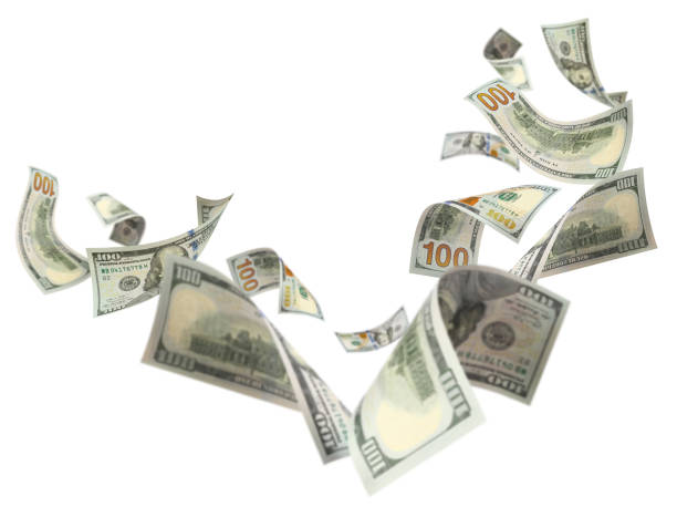 istock Flying 100 American dollars banknotes on white 1493712318