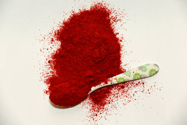 Close-Up Of Paprika On Wooden Table