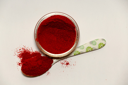 Red Chili Pepper In A Glass Bowl Isolated On White Background Table Top View