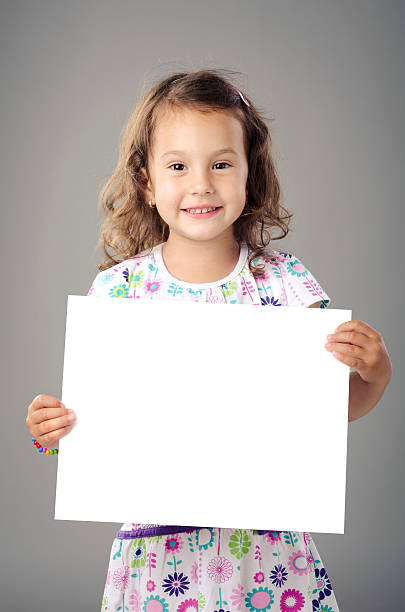 istock Little girl holding white board. 149371417