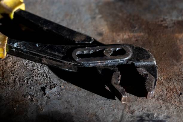 istock a small tool sitting on top of an old metal object 1493715347