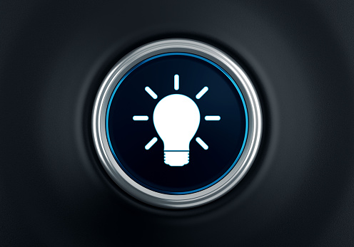 Light Bulb button On Dashboard. Communication Concept.