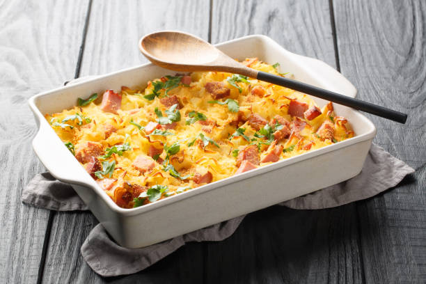 istock Austrian Baked Ham, Cheese, and Noodle Casserole closeup on the baking dish. Horizontal 1493719051