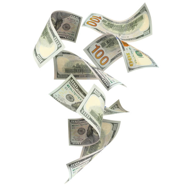 istock Flying 100 American dollars banknotes on white 1493723612