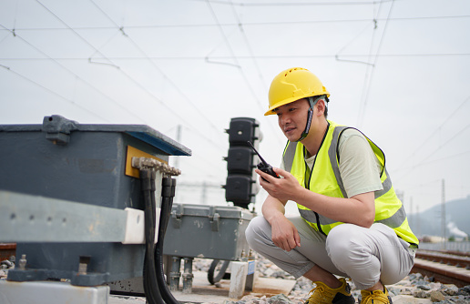 Engineer Testing Signal Path Engineer Testing Railway Signal Lights Stock Photo - Download Image Now ...