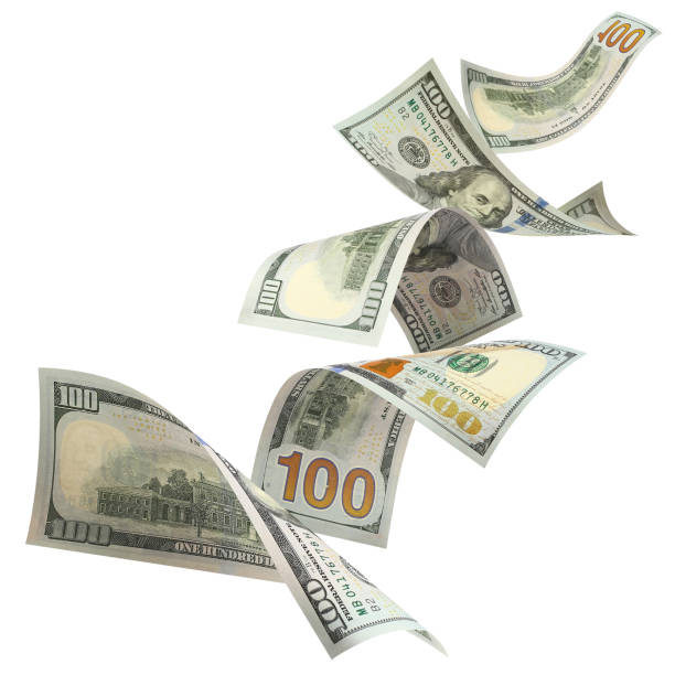 istock Flying 100 American dollars banknotes on white 1493725466