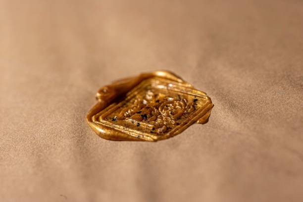 istock a wax seal is laying on top of a tan fabric 1493726172