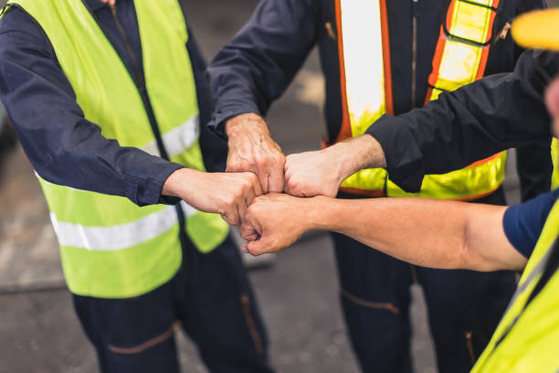 Workforce Hands In 21,600+ Hands Construction Teamwork Stock Photos, Pictures & Royalty ...