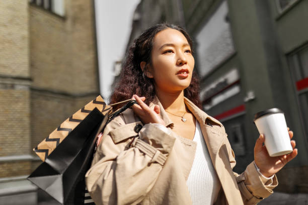 istock Serious looking woman with shopping bags 1493734294