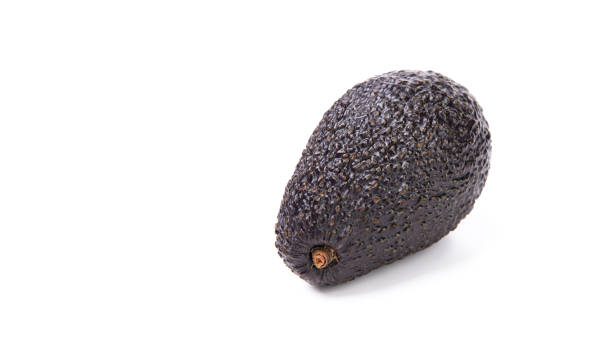 istock avocado pear fresh ripe vegetable isolated on white. copy space 1493734568