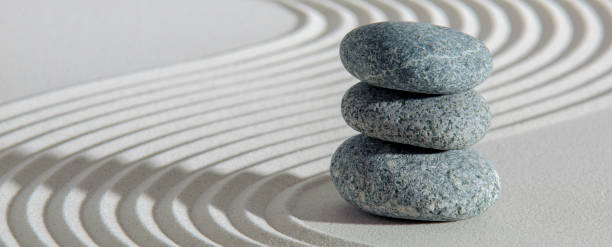 istock Japanese Zen garden with stone in textured sand 1493735810