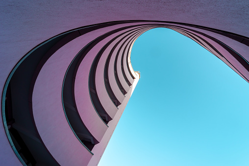 Low angle view of modern building against clear blue sky, Berlin Kreuzberg