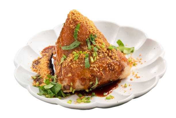 istock Vegetable zongzi isolated on white background. Vegetarian rice dumpling for Dragon Boat Festival. 1493737964