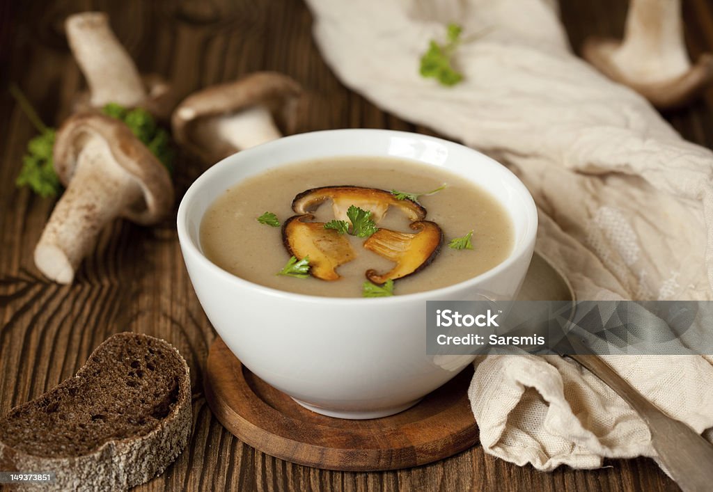 Mushroom soup Bowl of cream of mushroom soup with fried mushrooms Appetizer Stock Photo