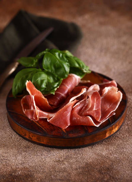 istock organic parma ham dry cured jamon on a wooden board 1493739188