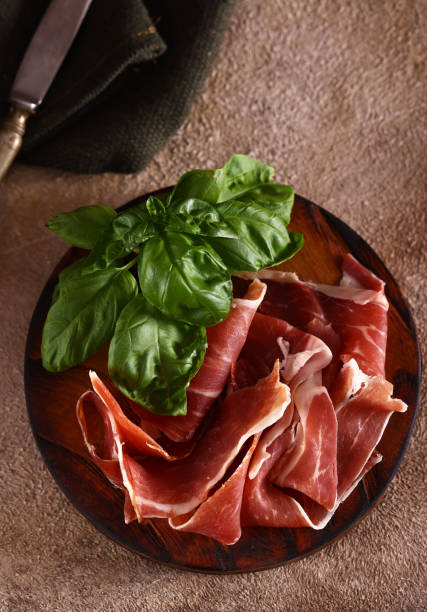 istock organic parma ham dry cured jamon on a wooden board 1493739191