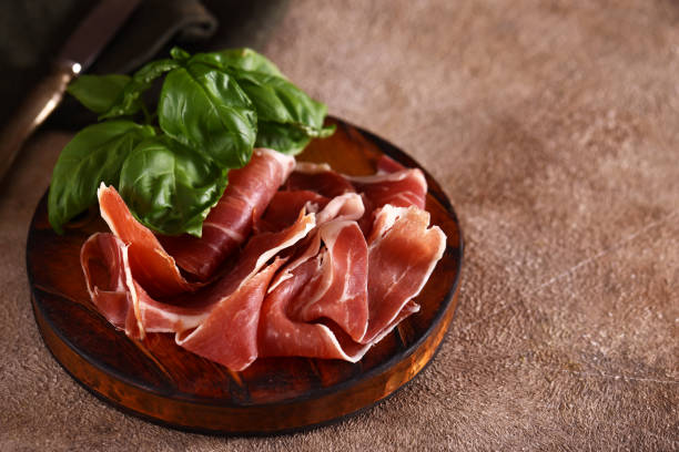 istock organic parma ham dry cured jamon on a wooden board 1493739195