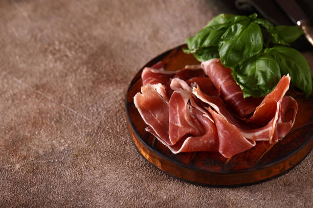istock organic parma ham dry cured jamon on a wooden board 1493739306